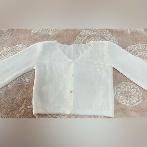 Adorable infant 0-3 months white knit sweater with pearl buttons and stitching
